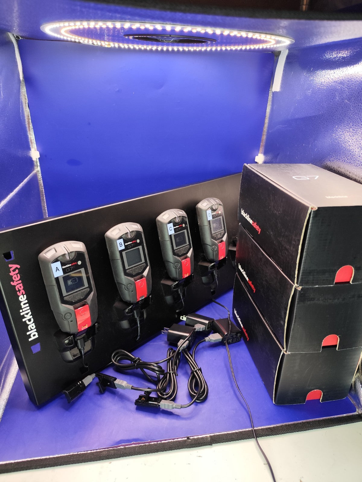 Set of 4 Blackline Safety G7c monitors with chargers And Charging Stand