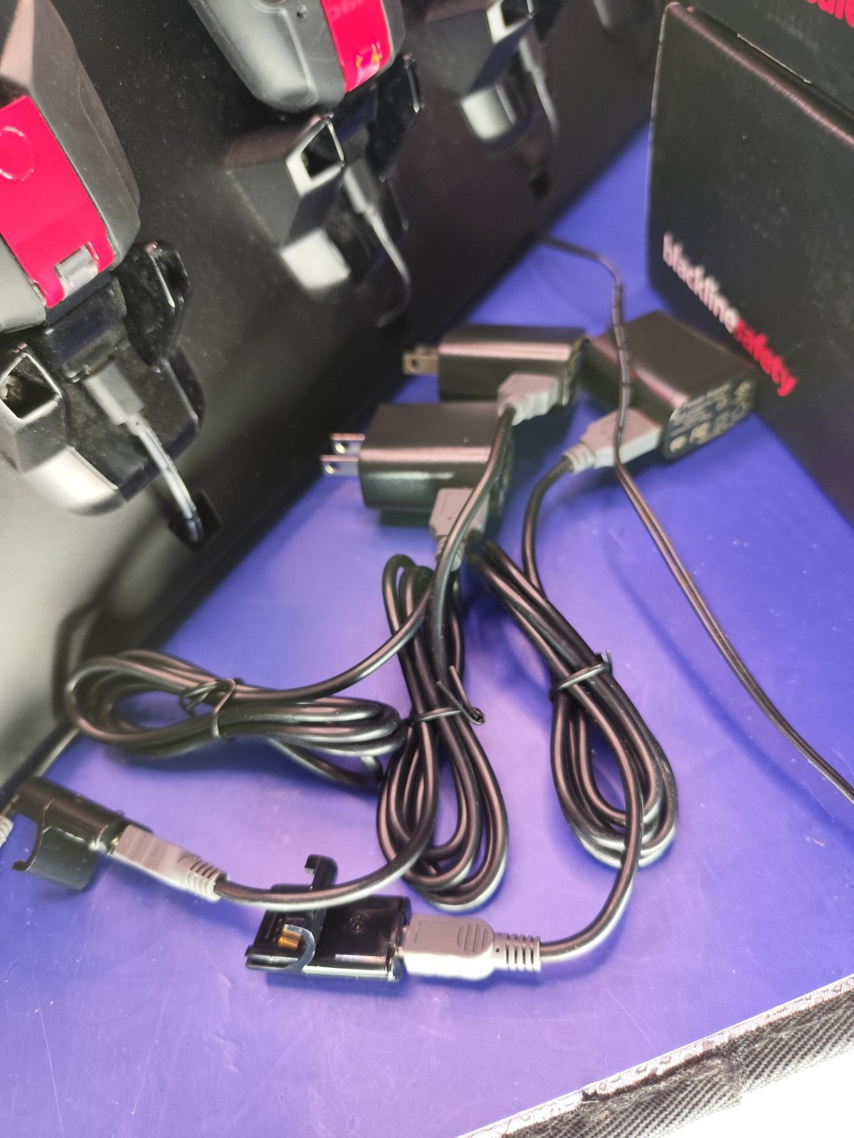 Set of 4 Blackline Safety G7c monitors with chargers And Charging Stand